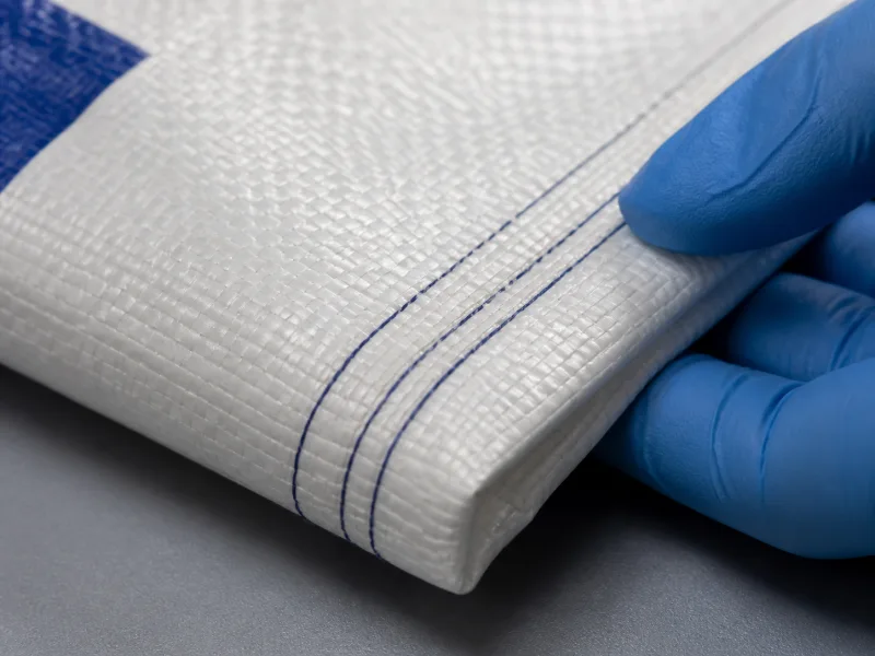 Stitching and Finishing Checks in a polymer packaging quality laboratory